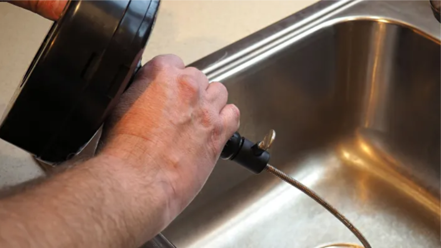 Sink Drain Clogged? How to Use a Plumber's Snake - Dengarden
